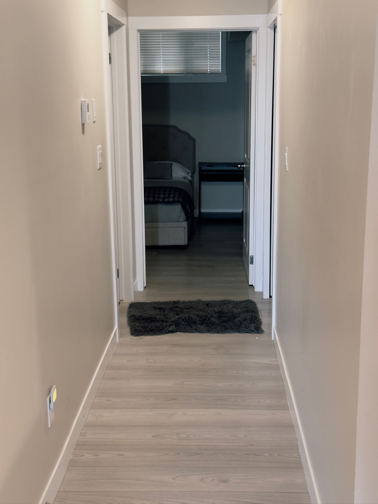 Monochromatic grey bedroom for cognitive rest