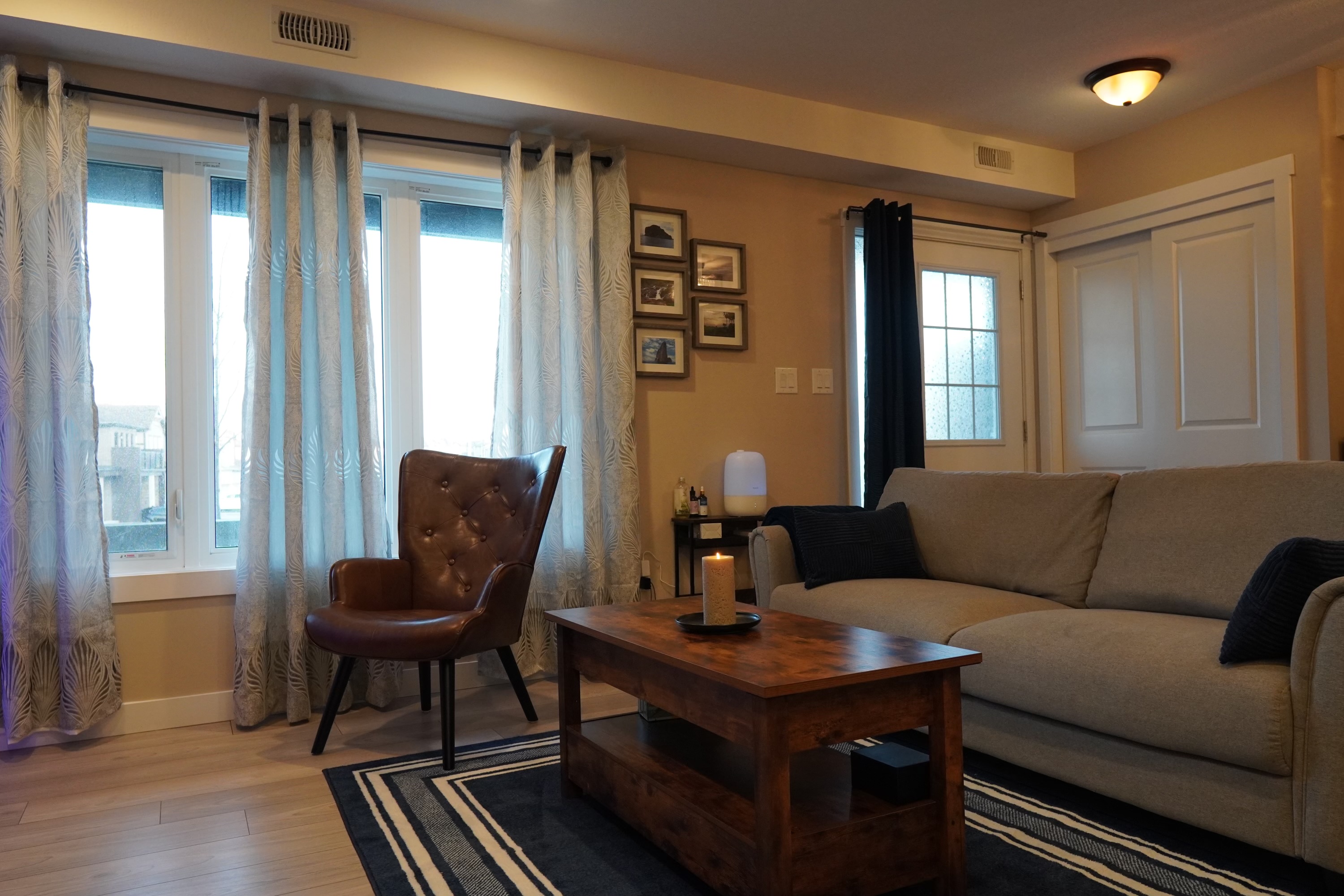 Living room with sheer curtains diffusing natural light